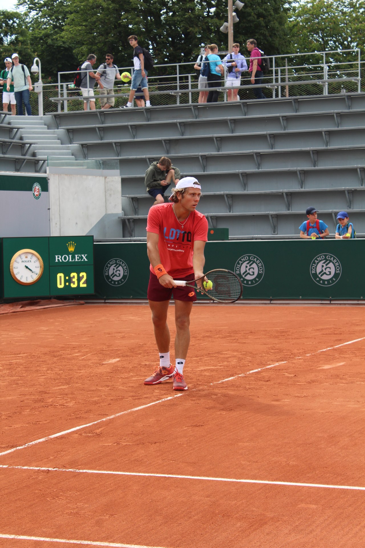 Aleksandar Kovacevic practising his serve at Roland Garros