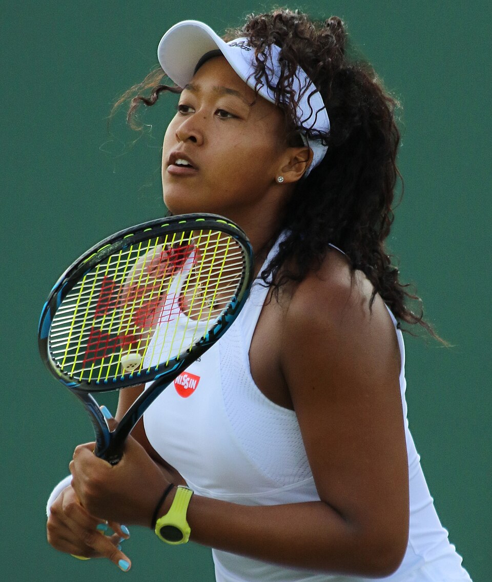 Naomi Osaka playing at Wimbledon